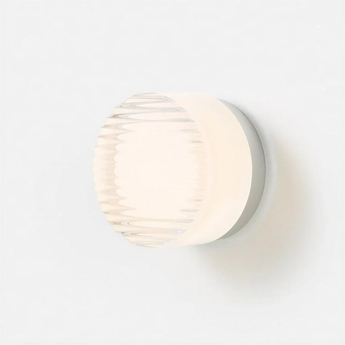 Modern Circular Wall Light With Ribbed Grated Glass And Ambient Glow