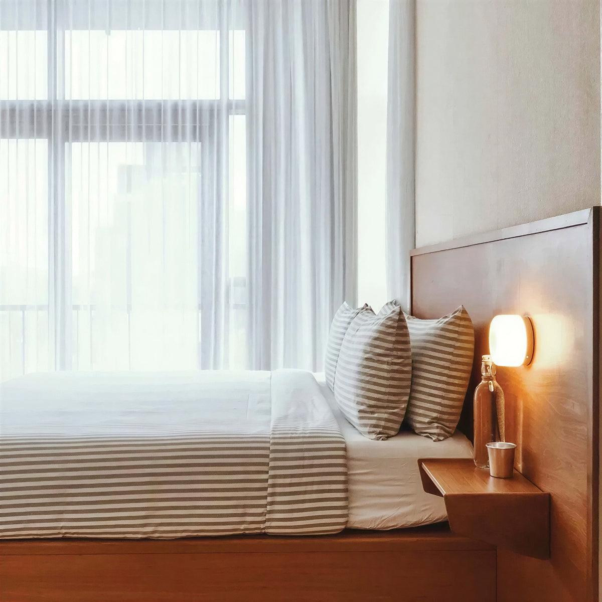 Wall Light Sconce With Modern Sculptural Dimple Design And Ambient Glow