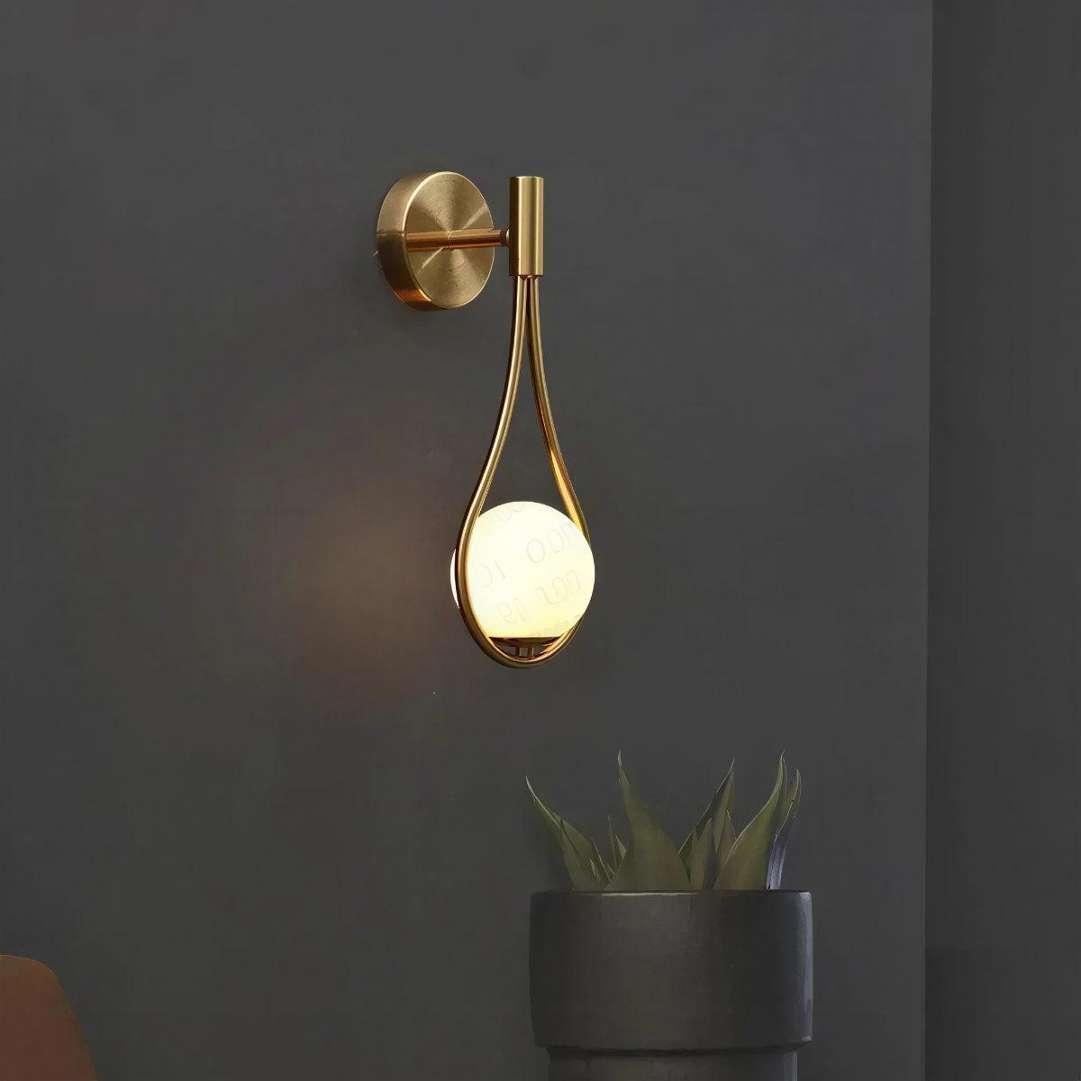 Contemporary Indoor Wall Mounted Light With Teardrop Styled Hanging Ambient Globe