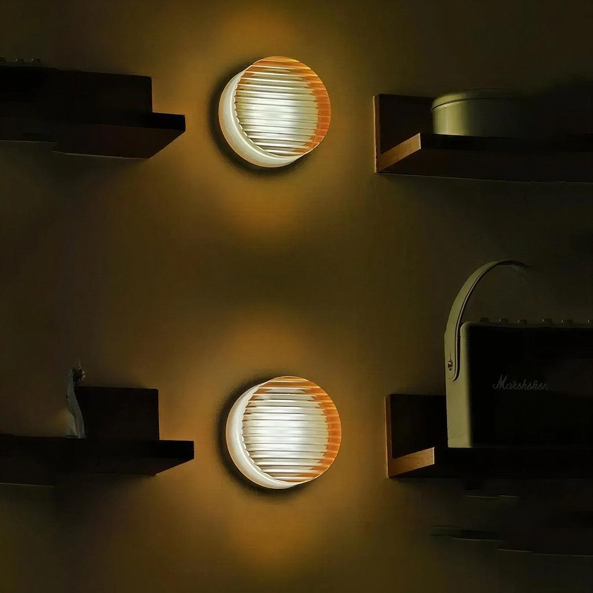 Modern Circular Wall Light With Ribbed Grated Glass And Ambient Glow