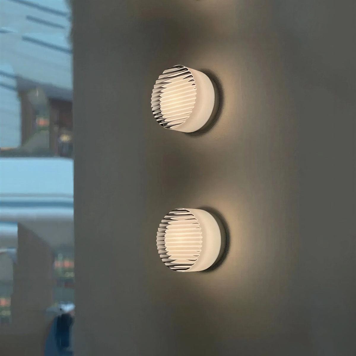 Modern Circular Wall Light With Ribbed Grated Glass And Ambient Glow